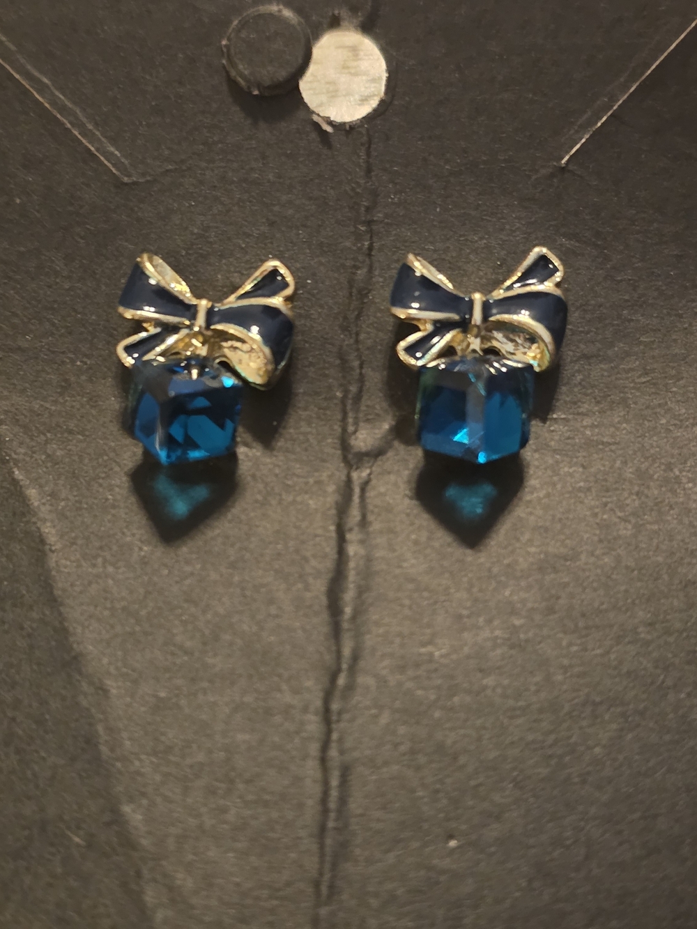 Gold Bow Stud Earrings with Blue Crystal Drop